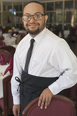 Image of young waiter with an intellectual disability