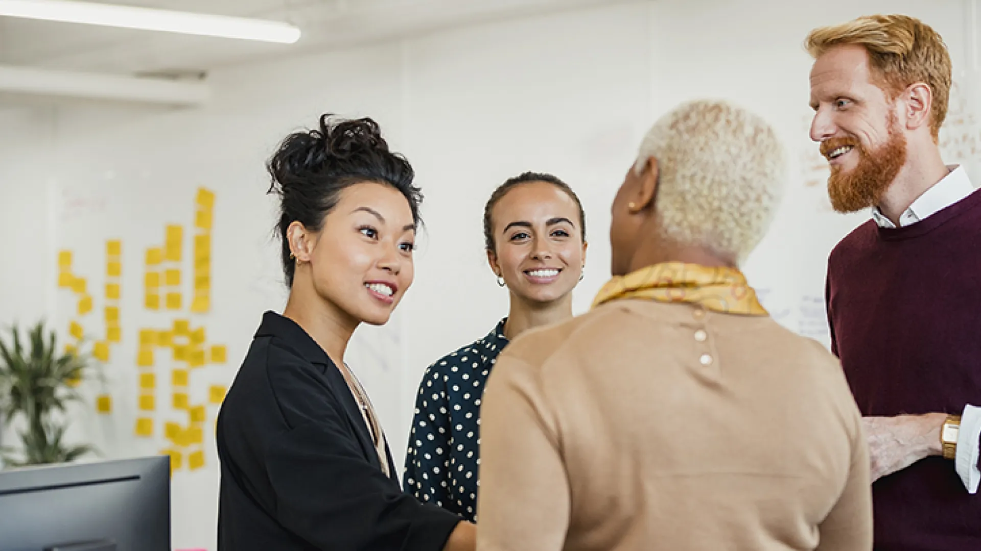 Diverse group of coworkers in conversation