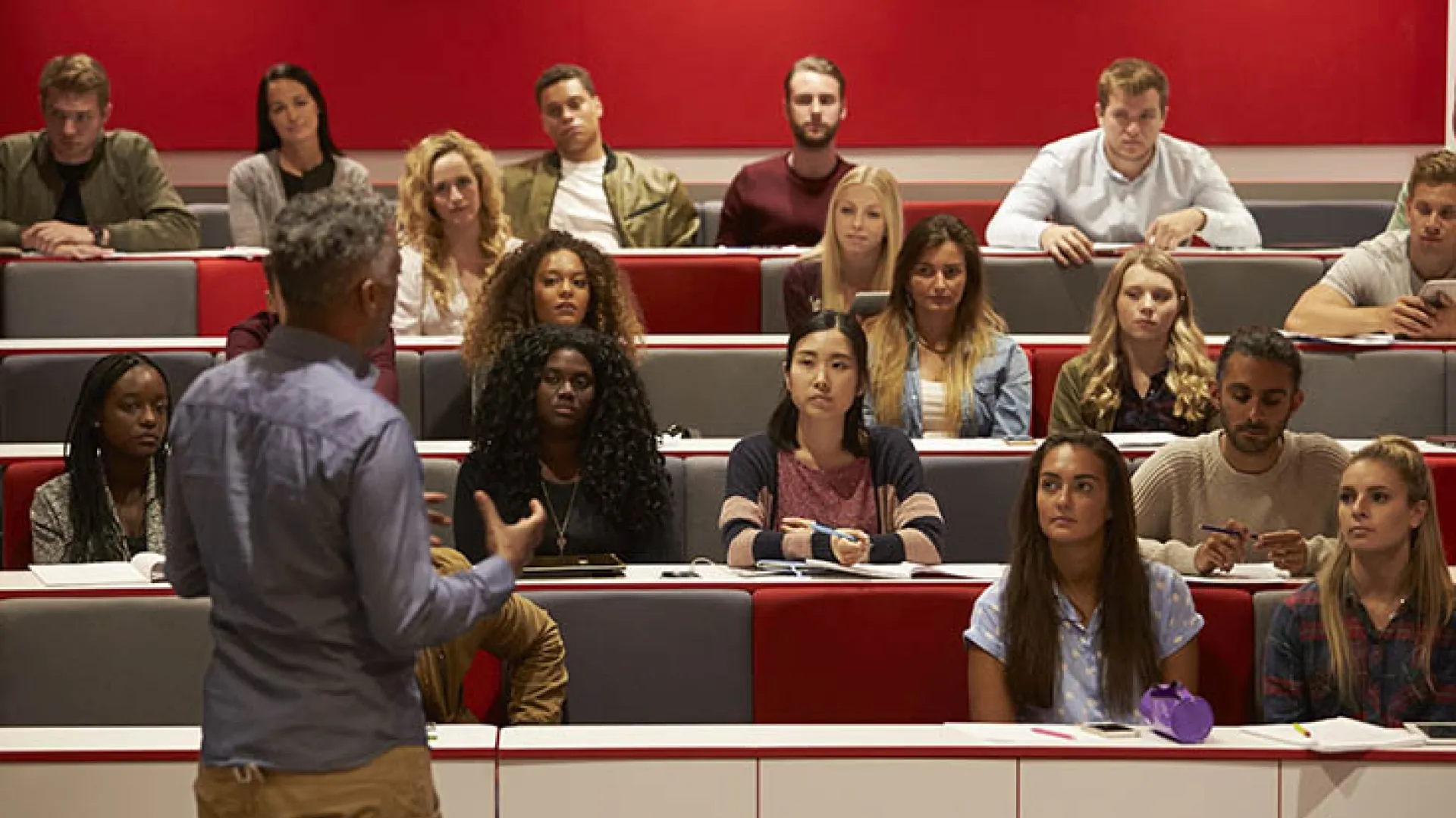 Professor teaching college students
