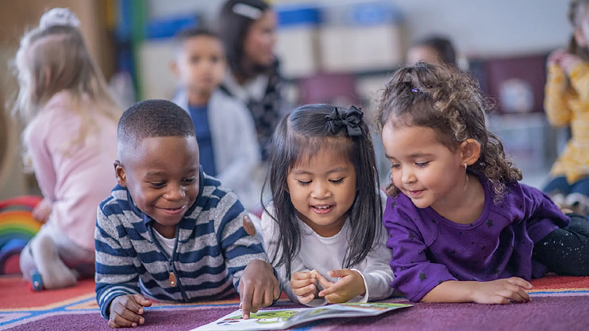 Three kids reading