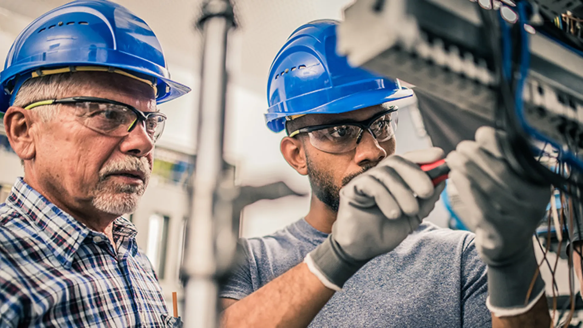 Electrician and apprentice