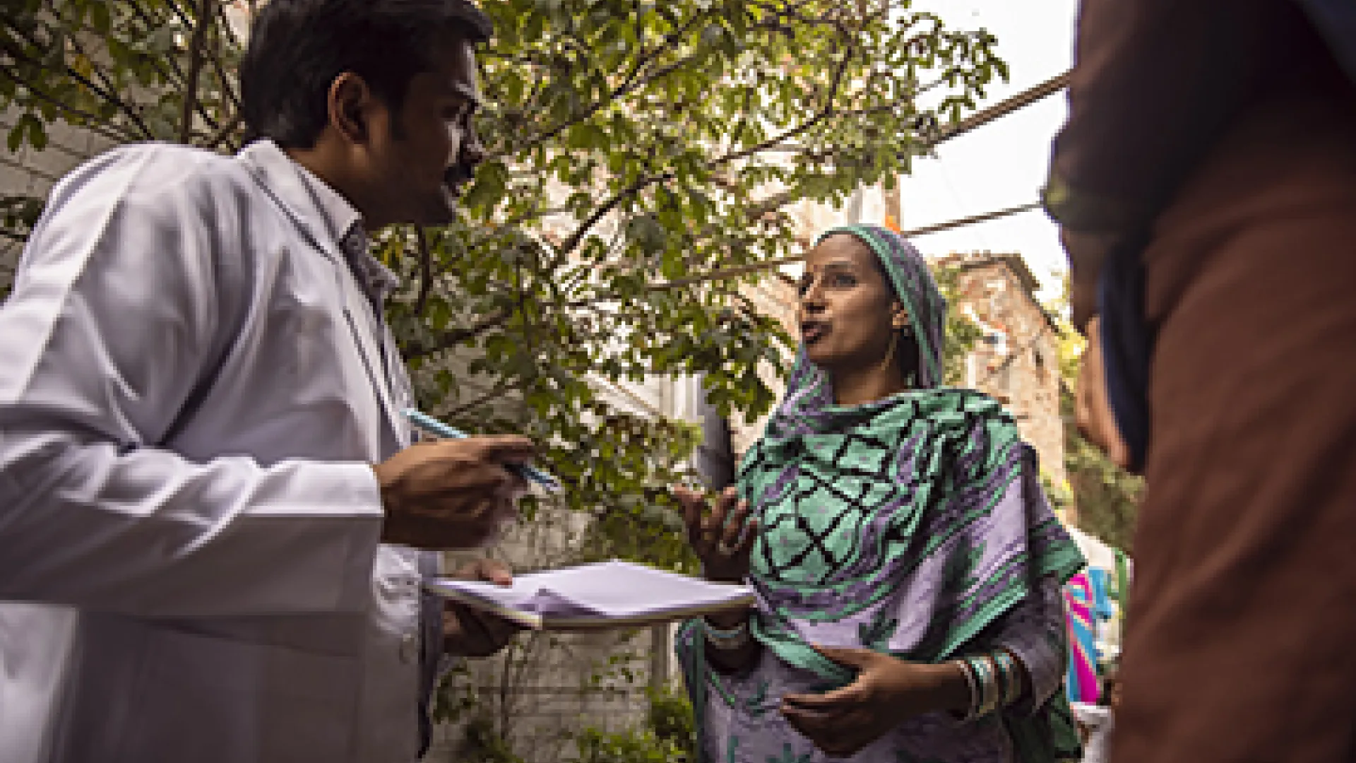 Doctor taking a survey in the field