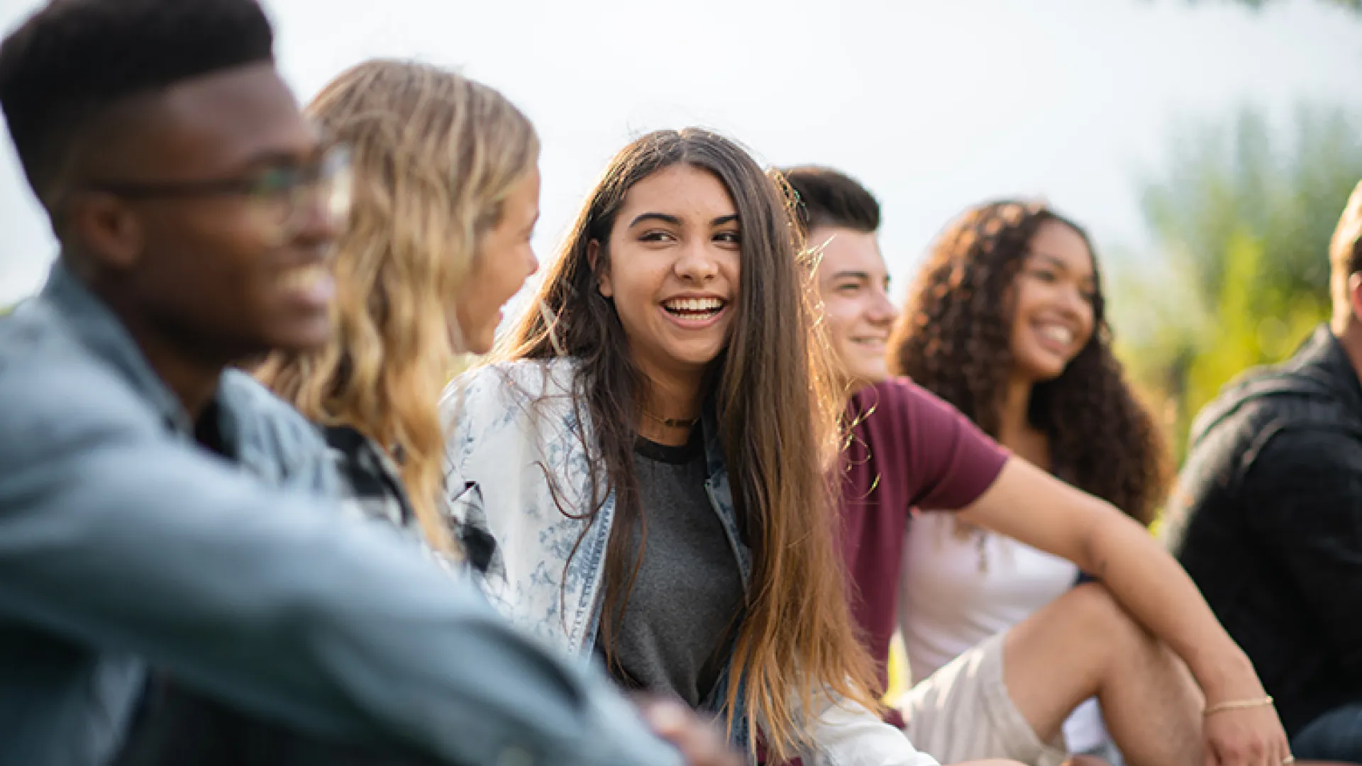 Diverse group of teenagers gathering