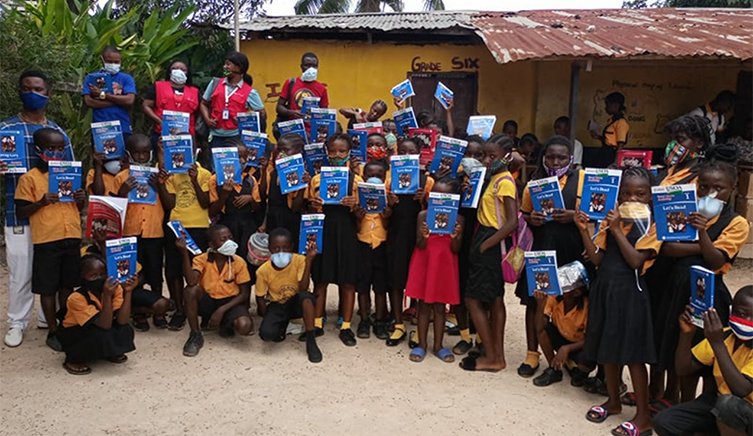 Children in Liberia receive books from Let's Read book distribution