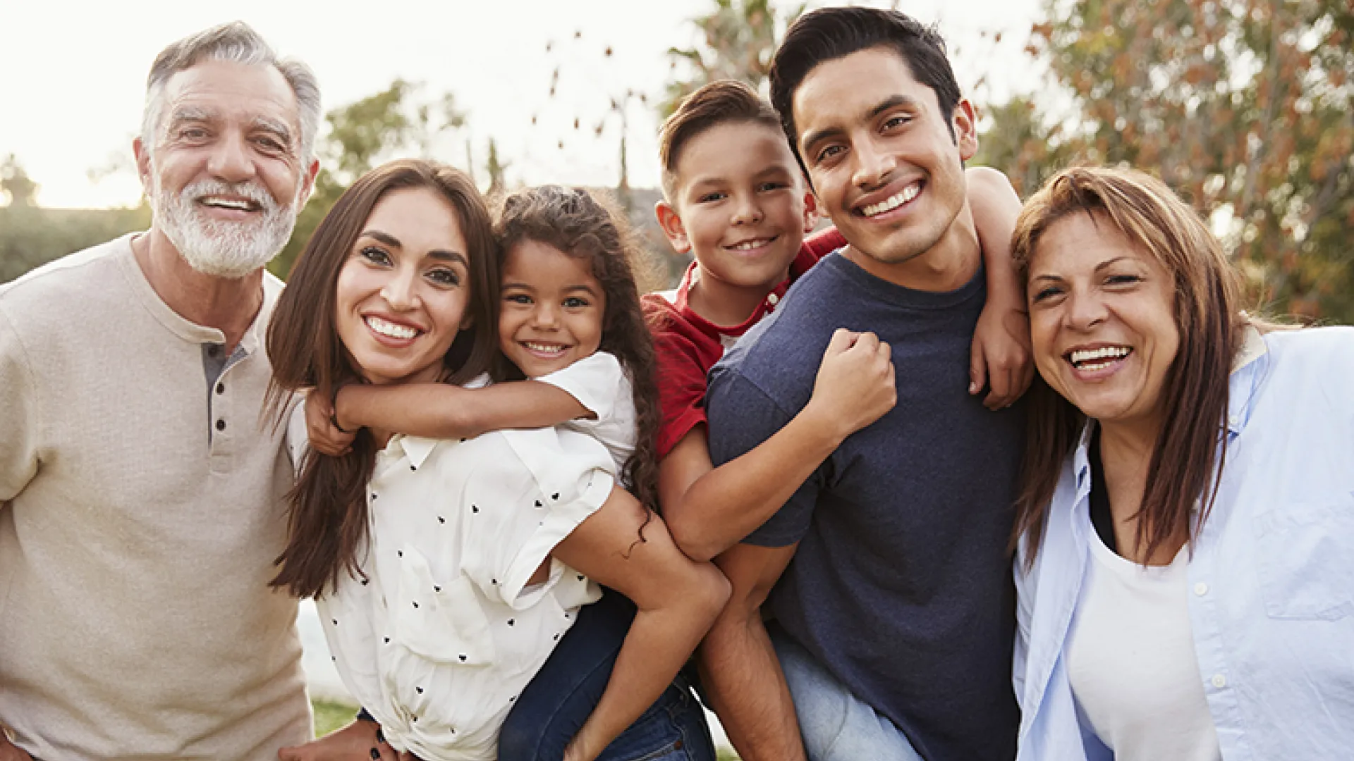 Diverse multigenerational family together outside