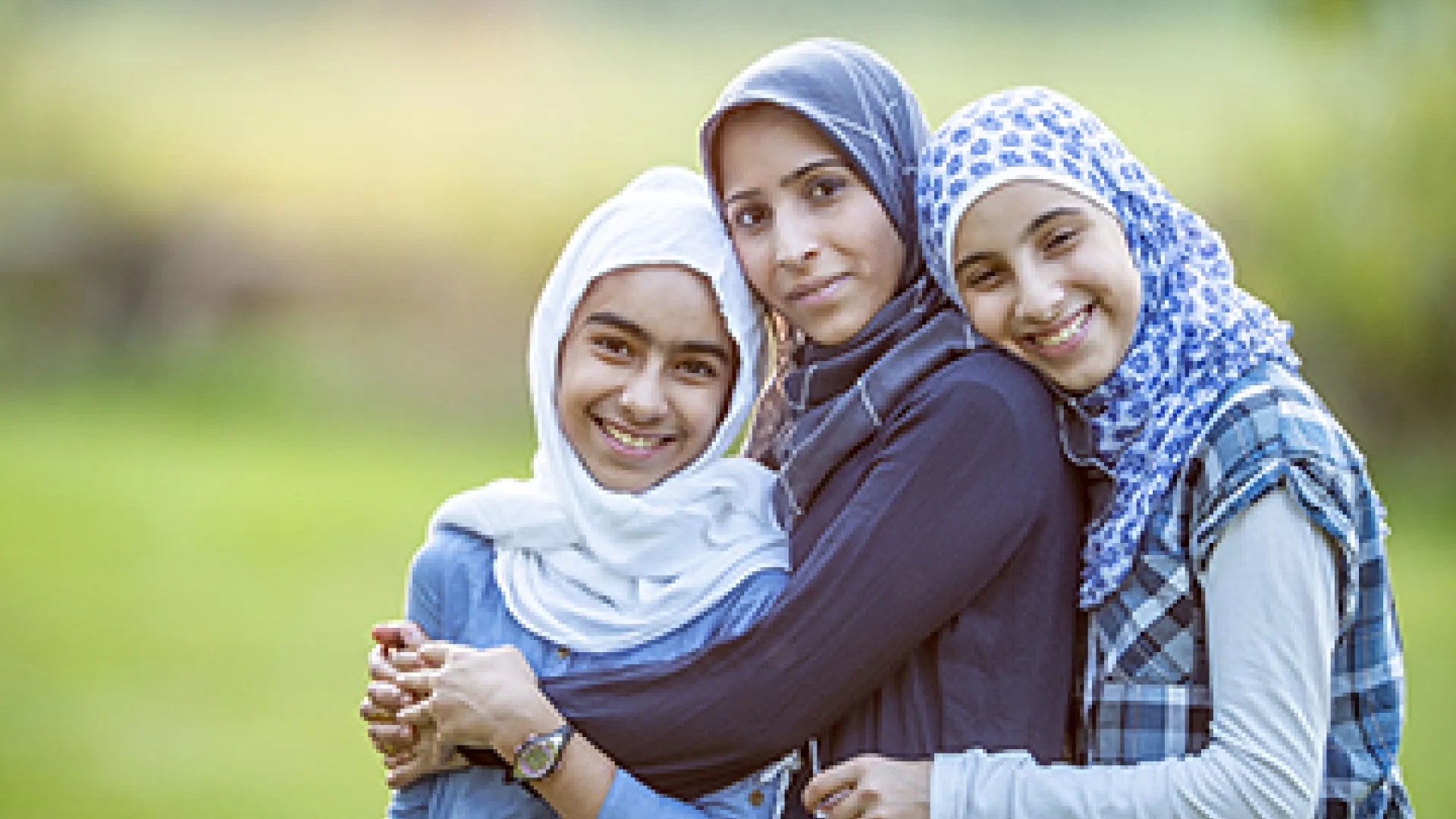 Three young Muslim women