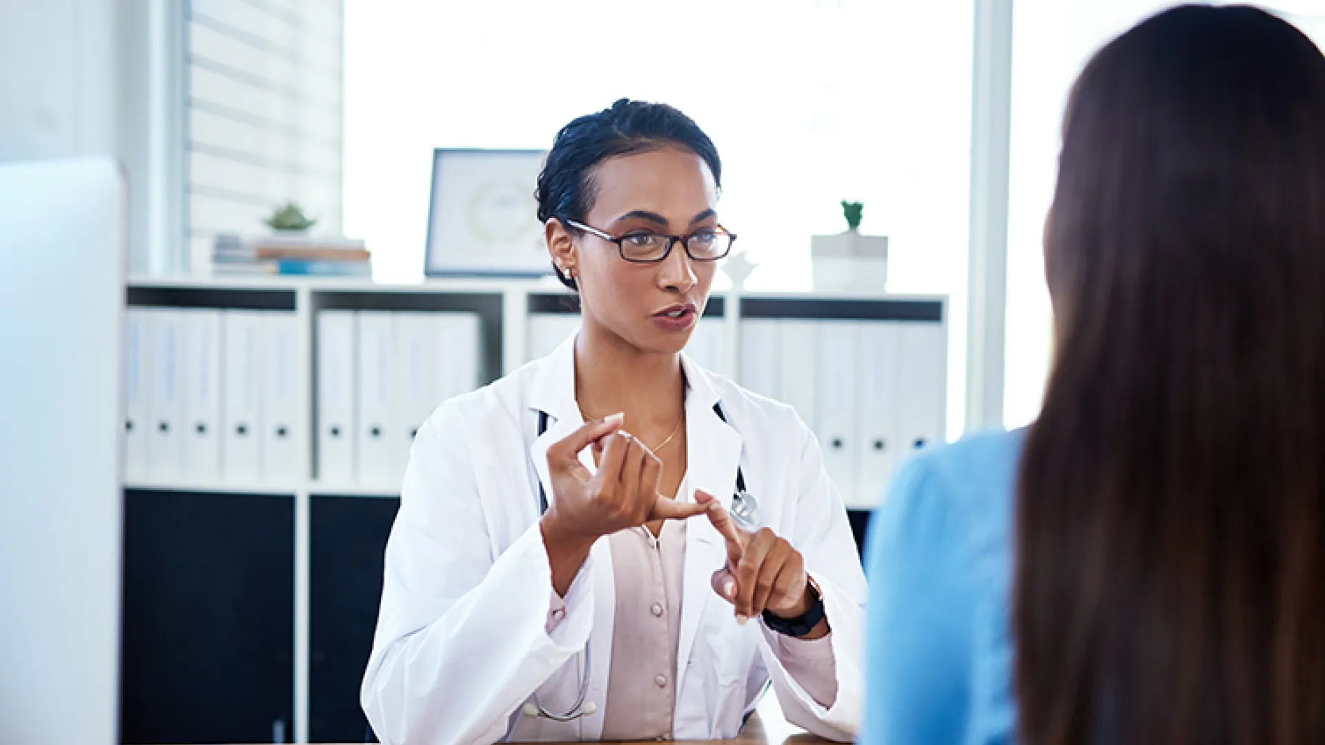 Healthcare provider explaining care to patient
