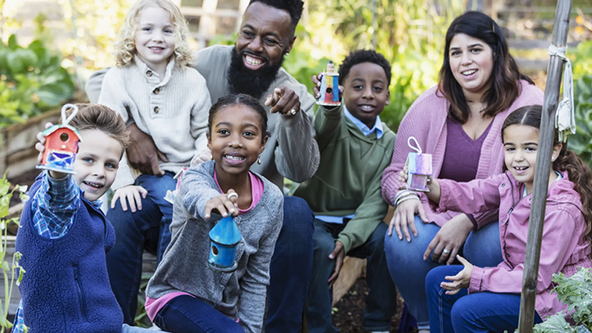Afterschool kids and adults playing outside