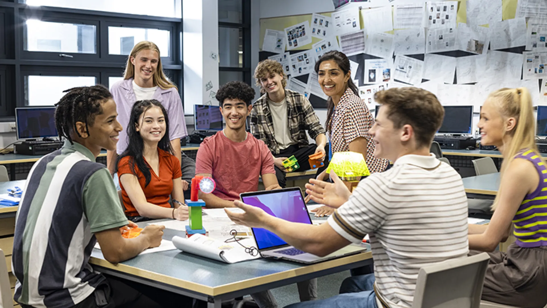 Happy high school students in a classroom