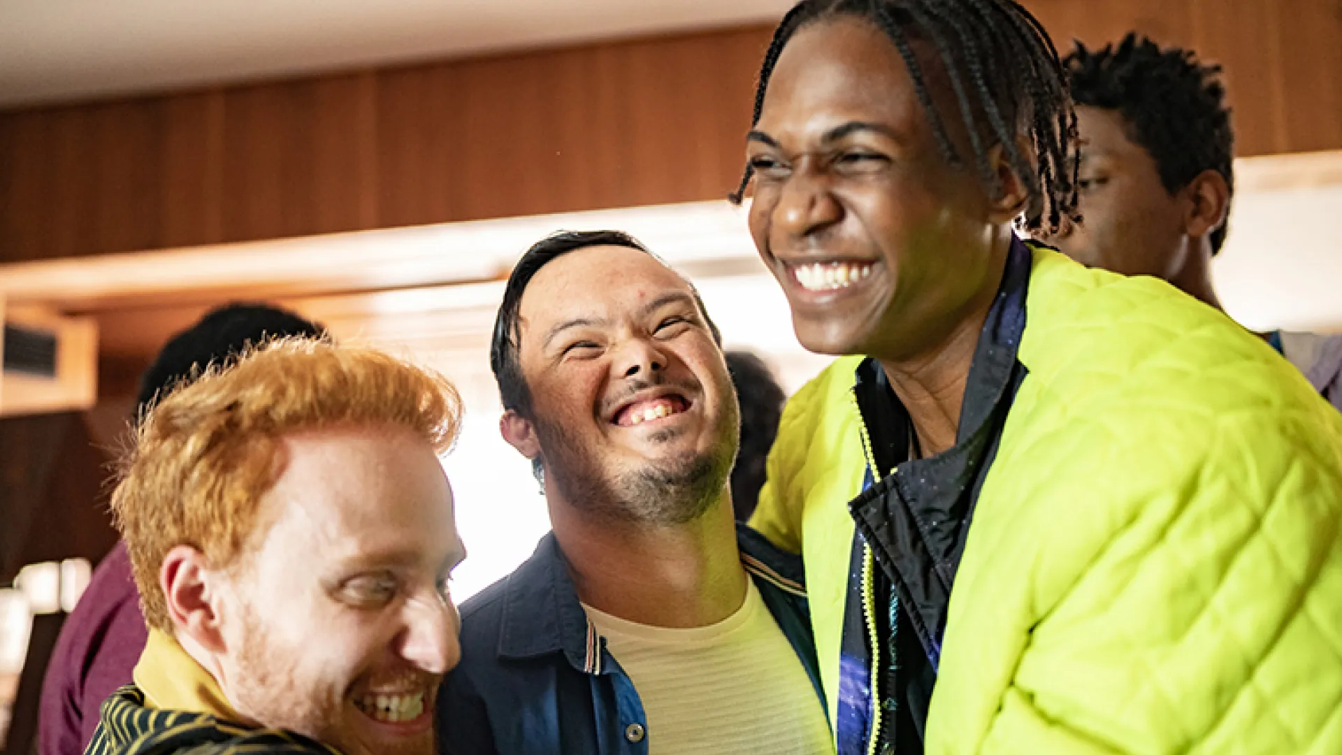 young disabled man having fun with friends