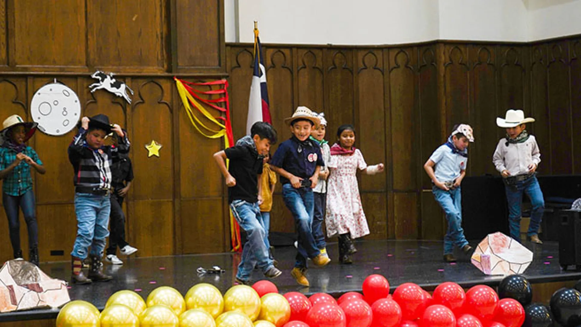 Kids dancing on stage in Texas