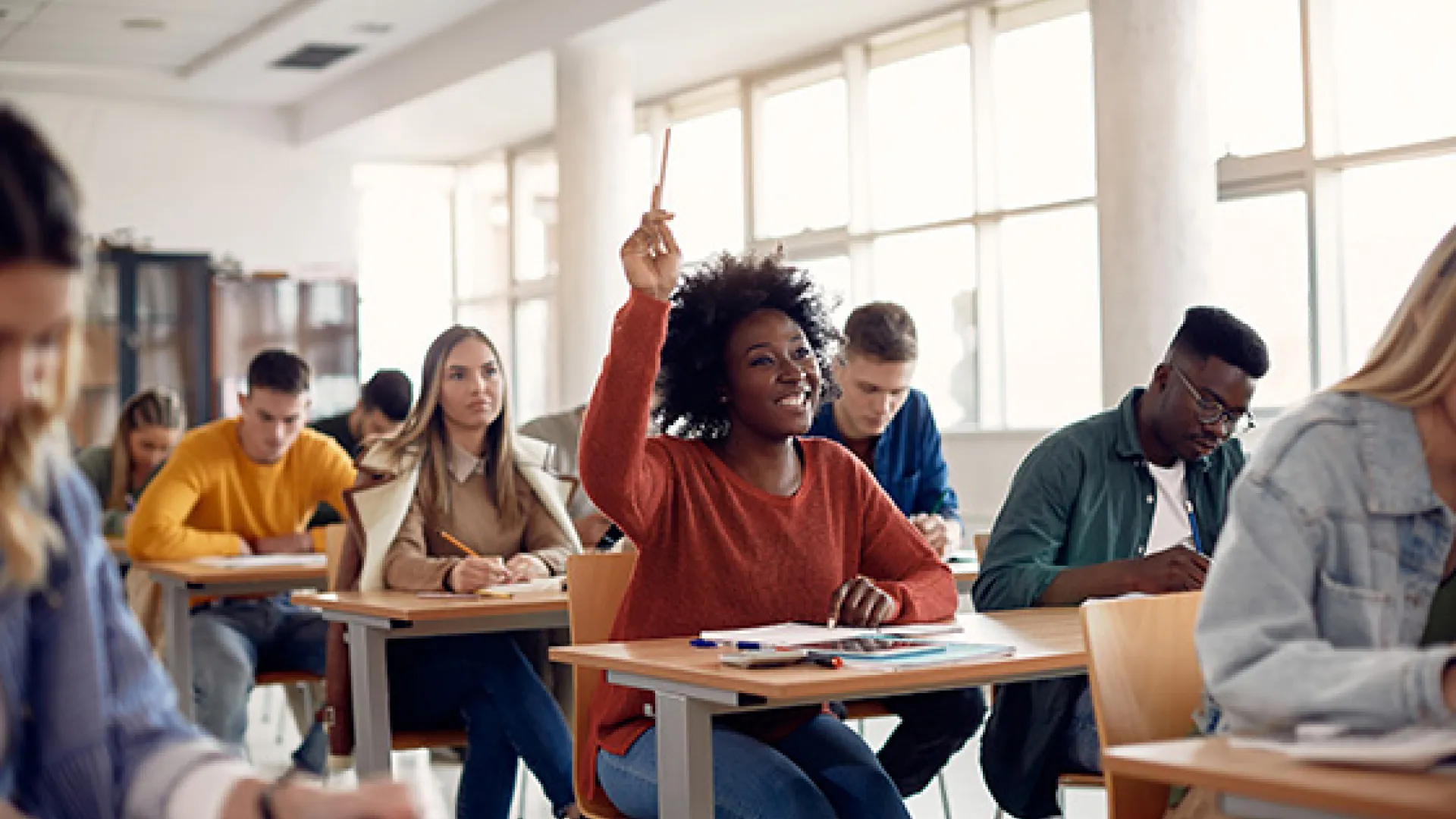 Young adult students in class