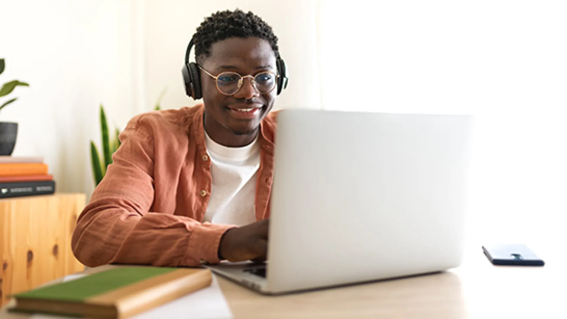 Student at laptop virtual learning