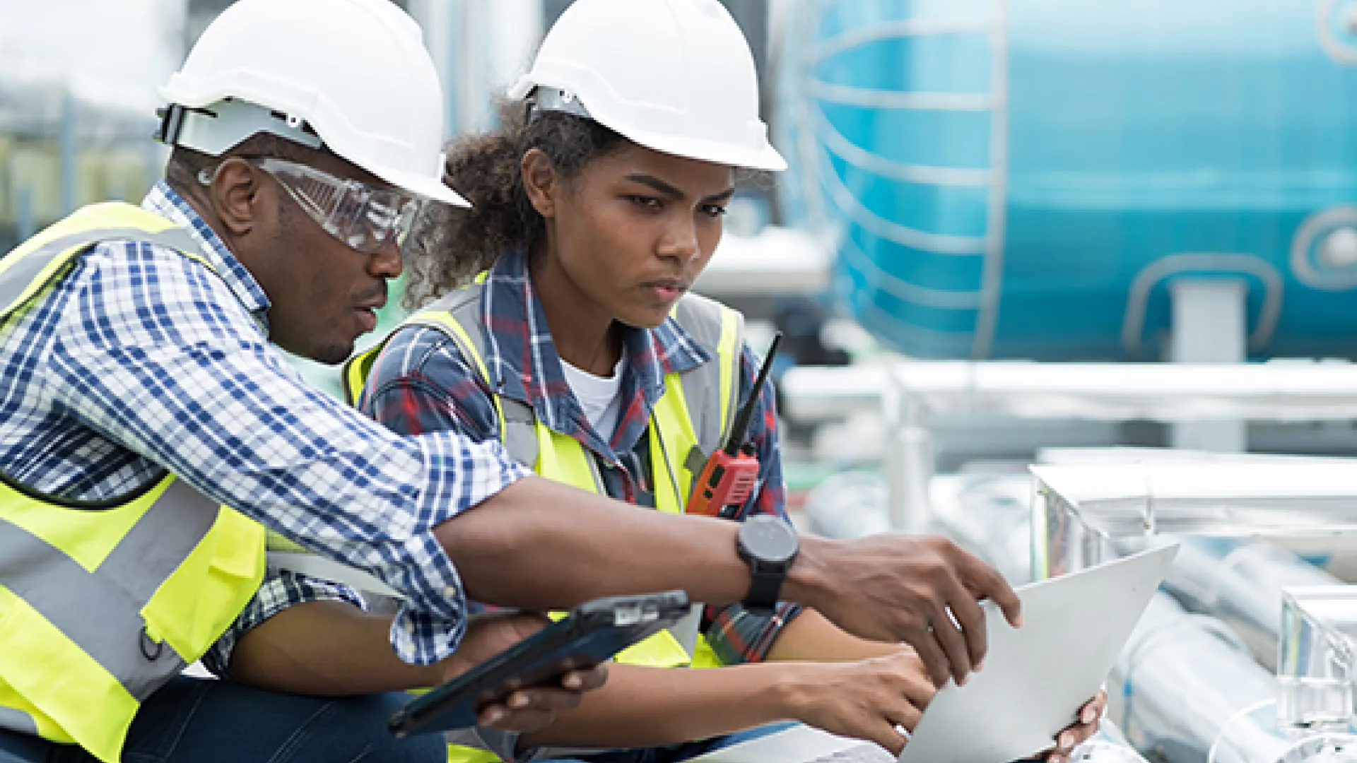 Construction apprentice with her trainer