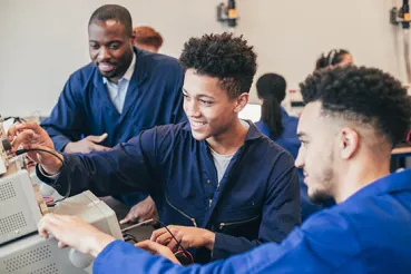 Apprentices working on computers