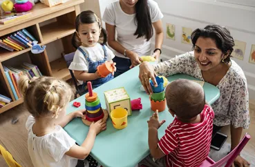 Teacher with young students