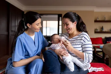 Home visit with mother and baby