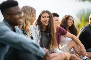 Diverse group of teenagers gathering