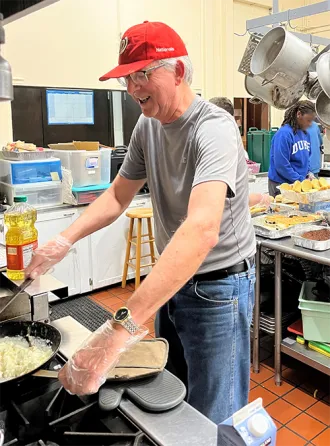 Tad Johnson volunteering at Charlie's Place
