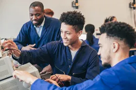 Apprentices working on computers