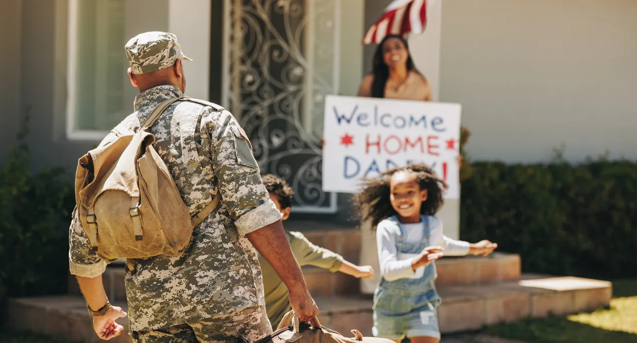 Soldier coming home to his family