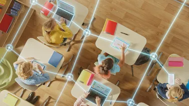 Students in a classroom connected by digital links