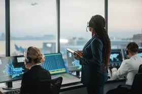 air traffic controllers overlooking airport