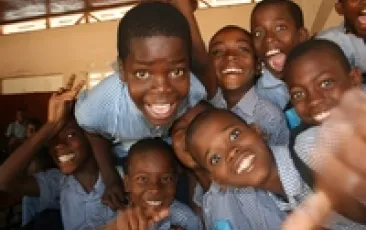 young Haitian students laughing 