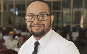 Image of young waiter with an intellectual disability