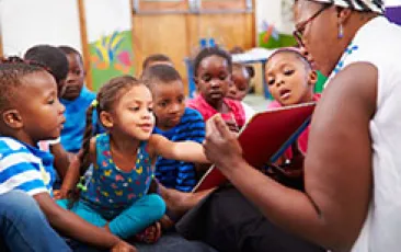 Preschool teacher with kids