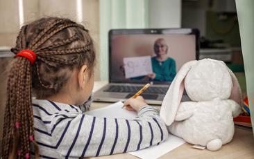 Image of young girl learning at her laptop