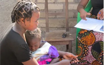 Image of mother in Zambia with young child