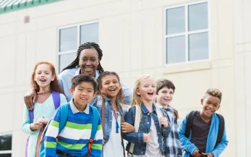 Teacher with students outside