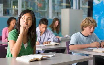 Students taking test in classroom