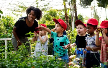 Young children working in a garden