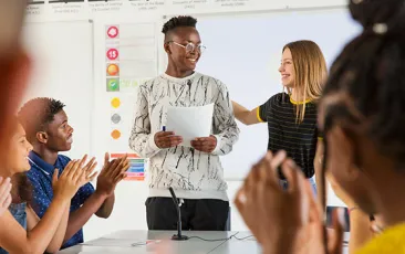 High school student presenting to class