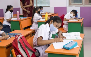 Female Indian student in class