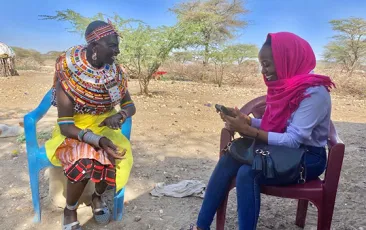 AIR data collector interviews a respondent in Samburu, Kenya as part of the PREG project