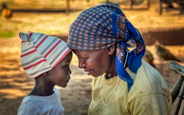 African granny together with her granddaughter