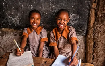 African little girls are learning English language, orphanage in Kenya