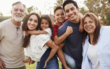 Diverse multigenerational family together outside