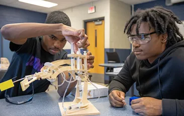 Students with educational models