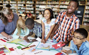Middle school students studying geography