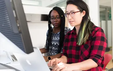 Women working at a computer