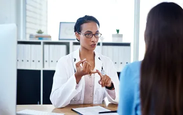 Healthcare provider explaining care to patient