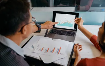 Researchers looking at data