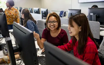 Young women in computer science class