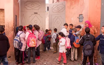 Primary school children with their teacher