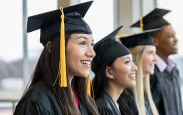 College graduates in caps and gowns