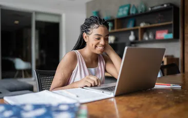 Girl working at laptop